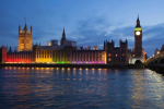 House of Commons lit up with the LGBTQ flag