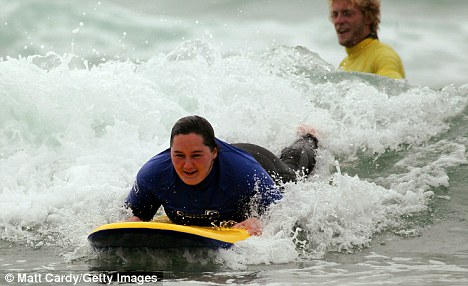 Ruth surfing in Newquay