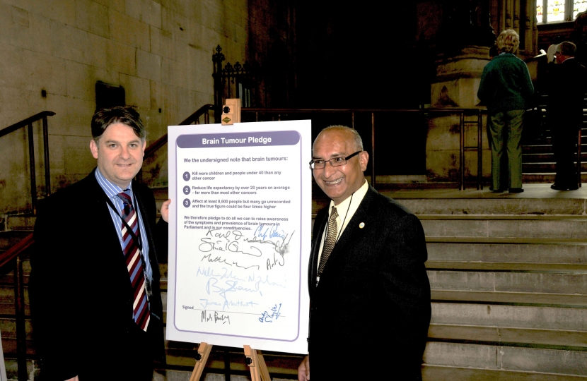 Philip with a constituent pledging support to Brain tumor research